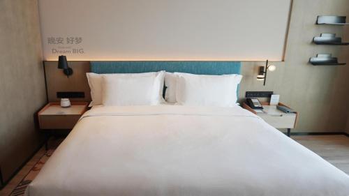 Imagen de la habitación del Hotel EVEN Yinchuan Yuehai, an IHG. Foto 18