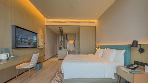 Imagen de la habitación del Hotel EVEN Yinchuan Yuehai, an IHG. Foto 19