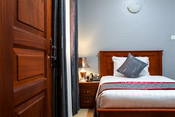 Imagen de la habitación del Hotel EXCELSIS GARDEN HOTEL. Foto 19