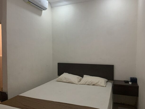 Imagen general del Hotel EXPRESS O 91662 Kost Rumah Kaca. Foto 1