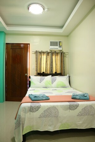 Imagen de la habitación del Hotel Ea Apartelle - Metro Vigan - Hostel. Foto 27