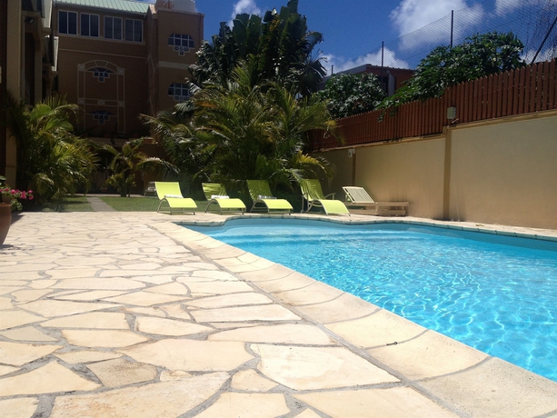 Imagen de la piscina del Hotel &Eacute;lys&eacute;e R&eacute;sidence, Trou aux Biches. Foto 13