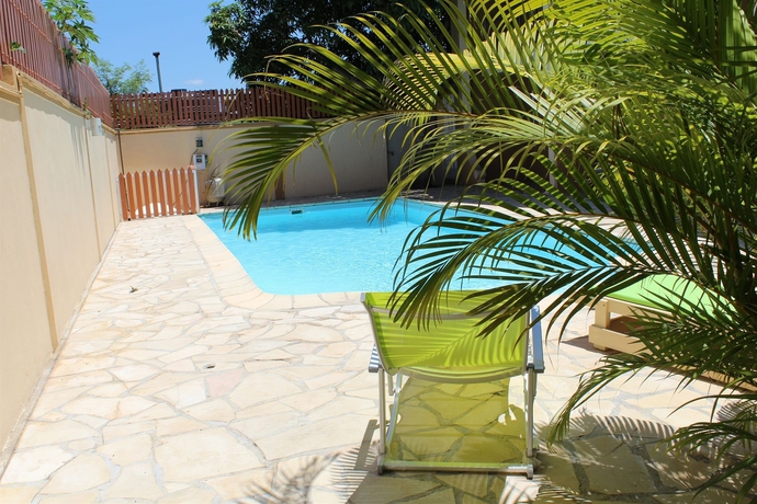 Imagen de la piscina del Hotel &Eacute;lys&eacute;e R&eacute;sidence, Trou aux Biches. Foto 16