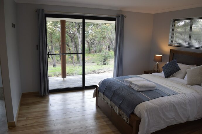 Imagen de la habitación del Hotel Eagle Bay House. Foto 16