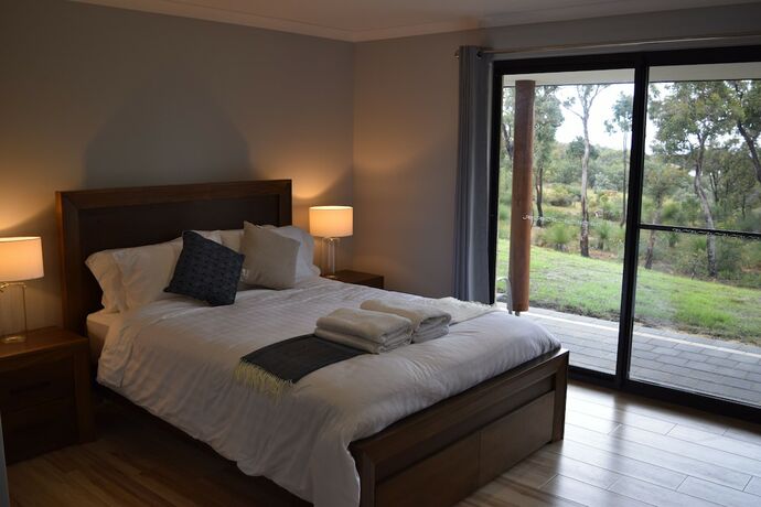 Imagen de la habitación del Hotel Eagle Bay House. Foto 17