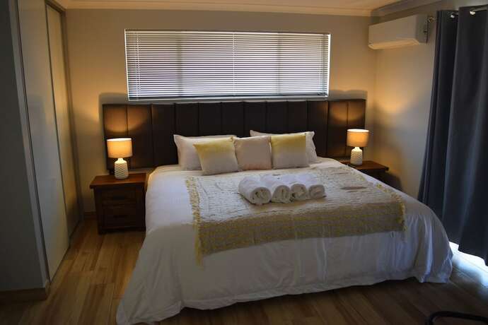 Imagen de la habitación del Hotel Eagle Bay House. Foto 19