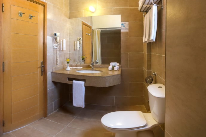 Imagen de la habitación del Hotel Eagle's Paradise Beach Resort Abu Soma. Foto 7