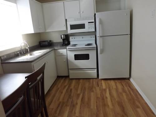 Imagen de la habitación del Hotel Eamon James Apartments & Suites. Foto 8