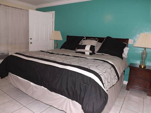 Imagen de la habitación del Hotel Eamon James Apartments & Suites. Foto 12