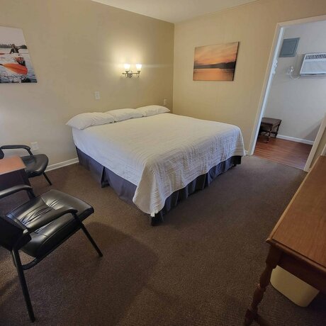 Imagen de la habitación del Hotel Early American Motel. Foto 19