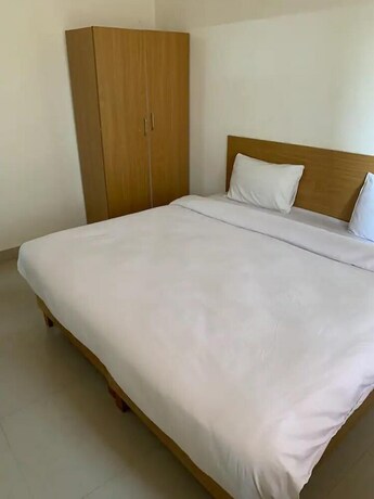 Imagen de la habitación del Hotel Earth View Residency. Foto 12