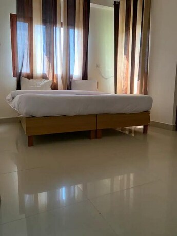 Imagen de la habitación del Hotel Earth View Residency. Foto 14