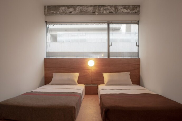 Imagen de la habitación del Hotel Earthmans Amemura. Foto 12