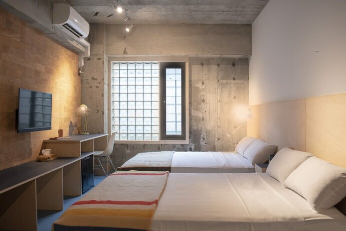 Imagen de la habitación del Hotel Earthmans Amemura. Foto 17