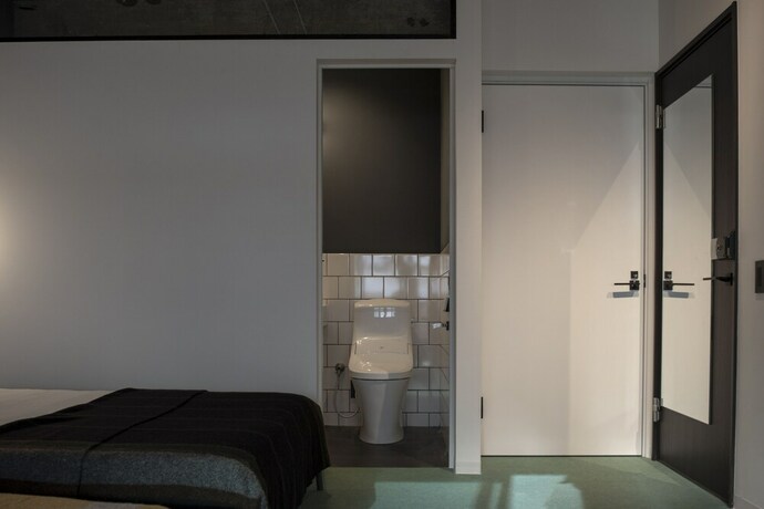 Imagen de la habitación del Hotel Earthmans Amemura. Foto 18