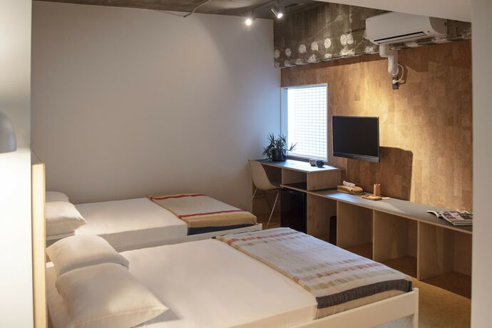 Imagen de la habitación del Hotel Earthmans Amemura. Foto 28