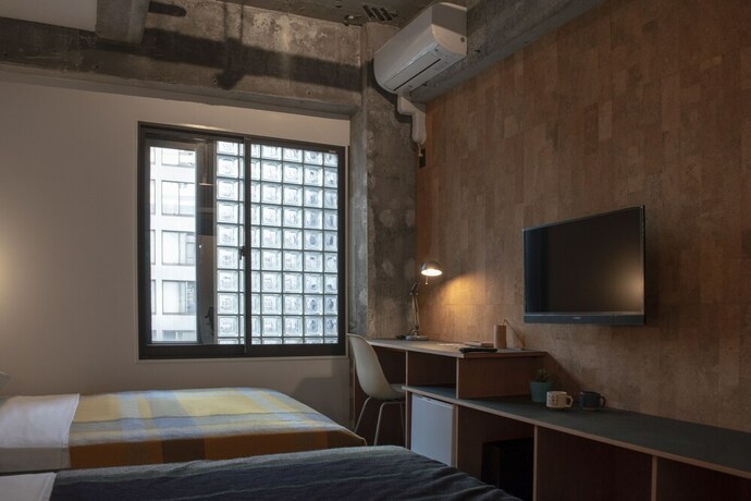 Imagen de la habitación del Hotel Earthmans Amemura. Foto 35