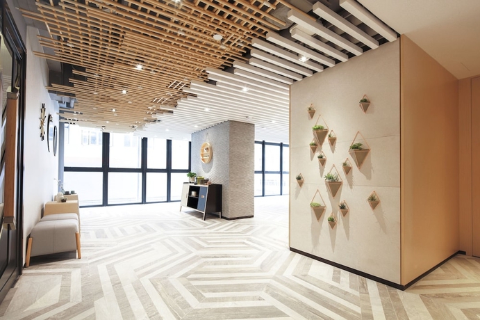 Imagen de los interiores del Hotel Ease Access Tsuen Wan. Foto 18