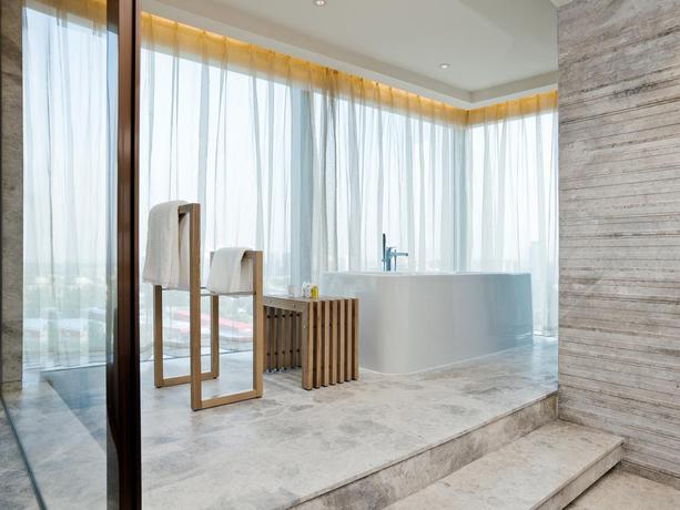 Imagen de la habitación del Hotel East Beijing. Foto 12