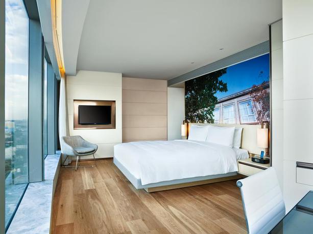 Imagen de la habitación del Hotel East Beijing. Foto 14