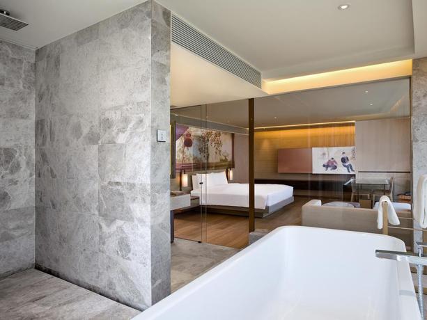 Imagen de la habitación del Hotel East Beijing. Foto 16