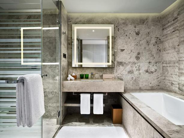 Imagen de la habitación del Hotel East Beijing. Foto 18