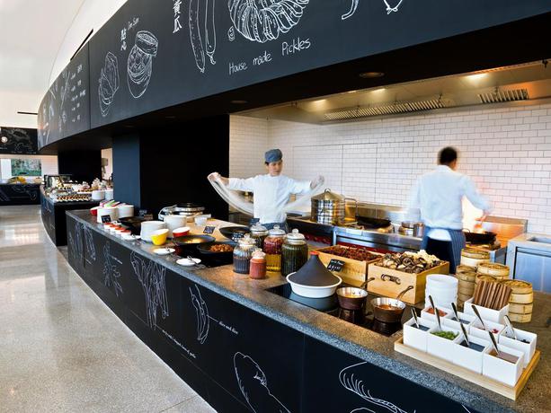Imagen del bar/restaurante del Hotel East Beijing. Foto 8