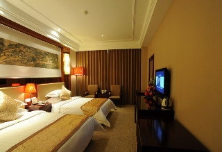 Imagen de la habitación del Hotel East Garden Hotel. Foto 7