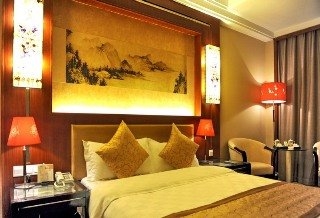 Imagen de la habitación del Hotel East Garden Hotel. Foto 8
