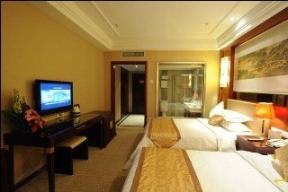 Imagen de la habitación del Hotel East Garden Hotel. Foto 9