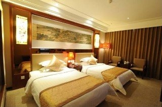 Imagen de la habitación del Hotel East Garden Hotel. Foto 10