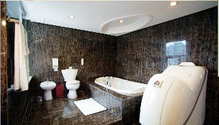 Imagen de la habitación del Hotel East Garden Hotel. Foto 12