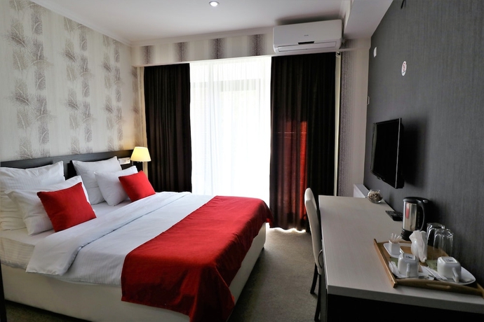 Imagen de la habitación del Hotel East Gate Boutique. Foto 7