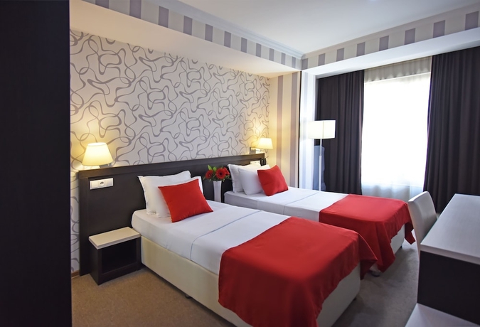 Imagen de la habitación del Hotel East Gate Boutique. Foto 10