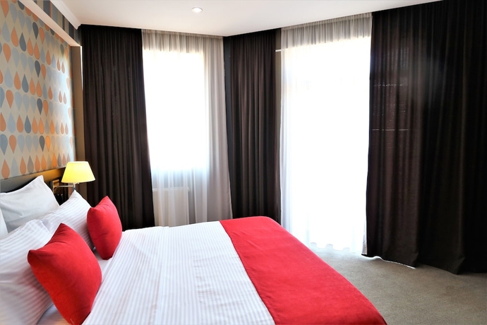 Imagen de la habitación del Hotel East Gate Boutique. Foto 11