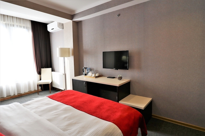 Imagen de la habitación del Hotel East Gate Boutique. Foto 12