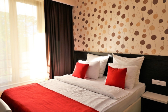 Imagen de la habitación del Hotel East Gate Boutique. Foto 13
