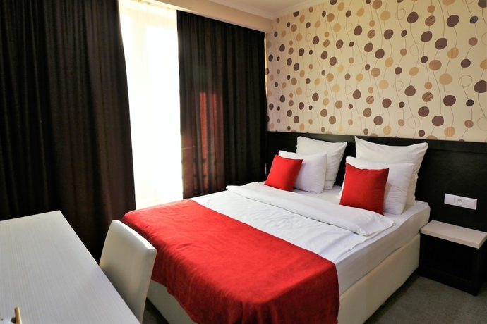 Imagen de la habitación del Hotel East Gate Boutique. Foto 14