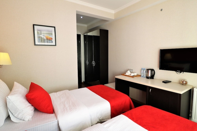 Imagen de la habitación del Hotel East Gate Boutique. Foto 15