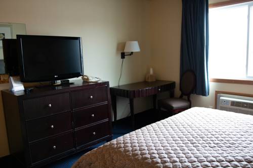 Imagen de la habitación del Hotel East Grand Inn. Foto 2