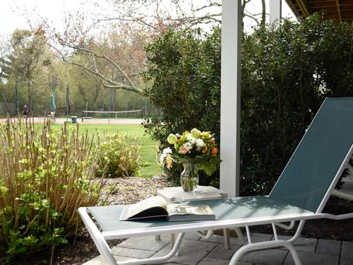 Imagen de la habitación del Hotel East Hampton House Resort. Foto 12