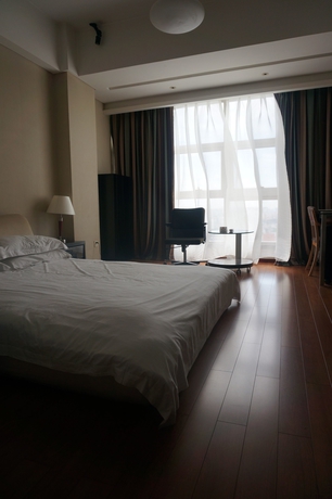 Imagen de la habitación del Hotel East King Business Hangzhou. Foto 2