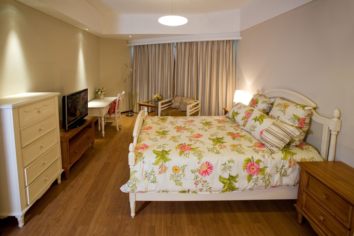 Imagen de la habitación del Hotel East King Business Hangzhou. Foto 6