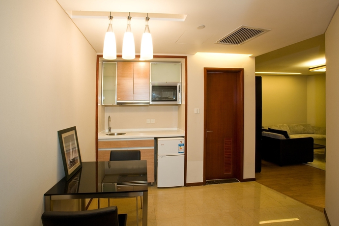 Imagen de la habitación del Hotel East King Business Hangzhou. Foto 8