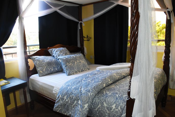 Imagen de la habitación del Hotel East Point Moshi. Foto 6