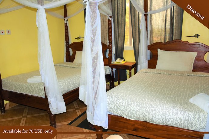 Imagen de la habitación del Hotel East Point Moshi. Foto 12