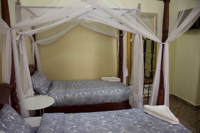 Imagen de la habitación del Hotel East Point Moshi. Foto 17