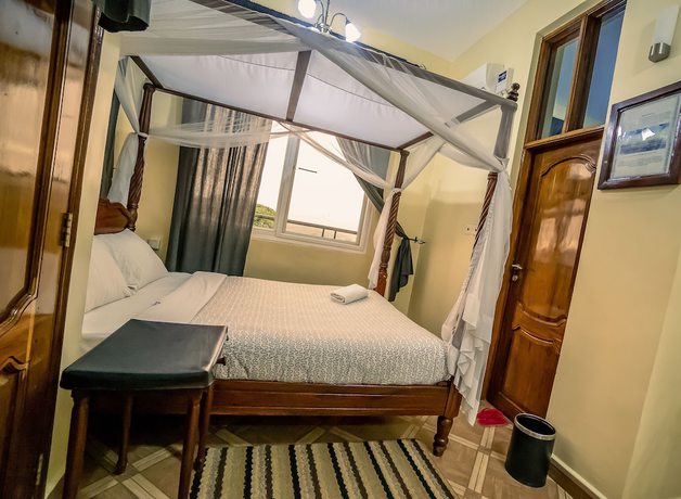 Imagen de la habitación del Hotel East Point Moshi. Foto 19