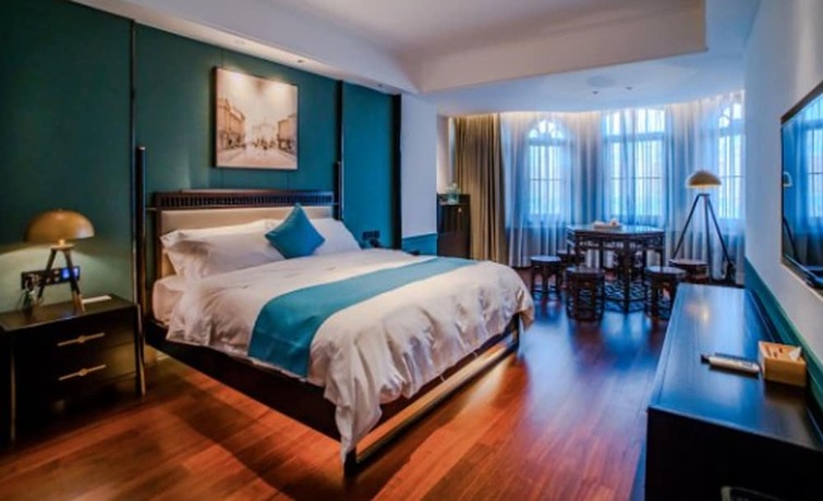 Imagen de la habitación del Hotel East Sea Chaozhou. Foto 12