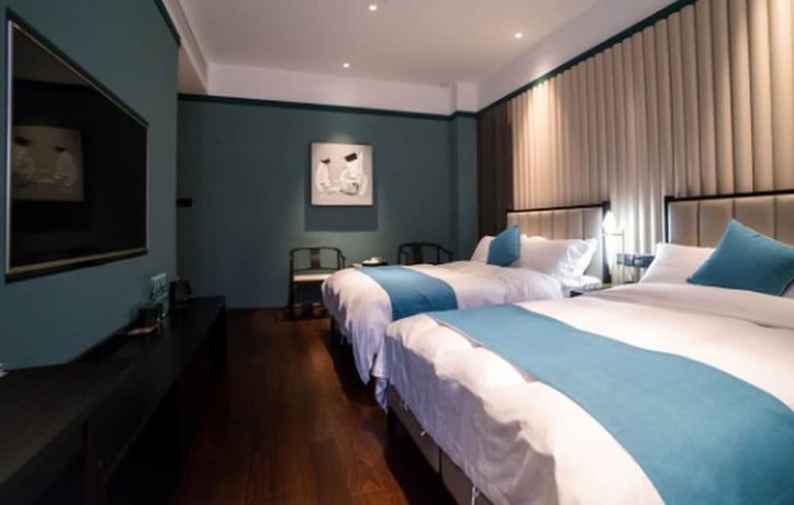 Imagen de la habitación del Hotel East Sea Chaozhou. Foto 14